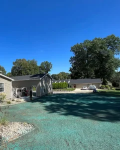 Hydroseeding application for even lawn coverage on a large residential property