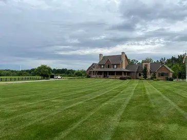 Freshly mowed striped lawn at a residential property in Boardman, Ohio
