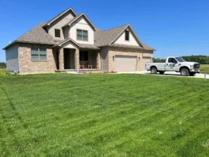 Freshly mowed lawn at a residential home in Youngstown Ohio by JTR Lawn & Landscape