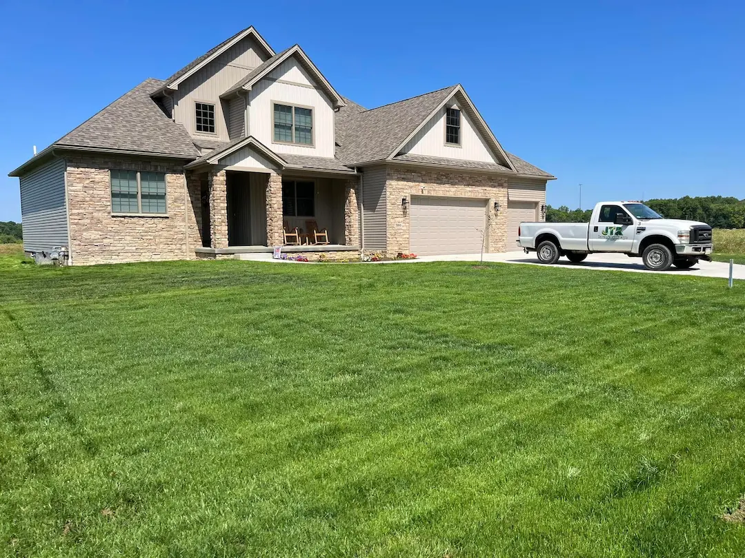 Freshly mowed lawn at a residential home in Youngstown Ohio by JTR Lawn & Landscape