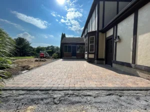 Finished paver patio installation creating clean outdoor living space at residential home